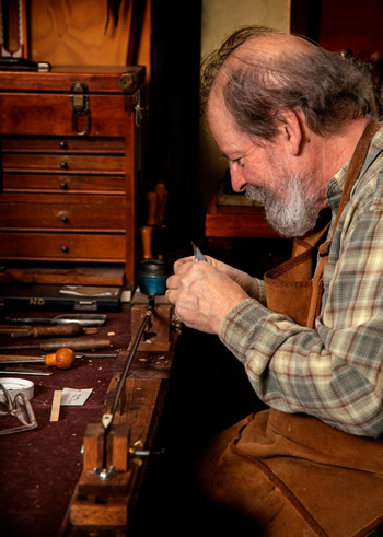 photo of Stephen Bacon working in shop